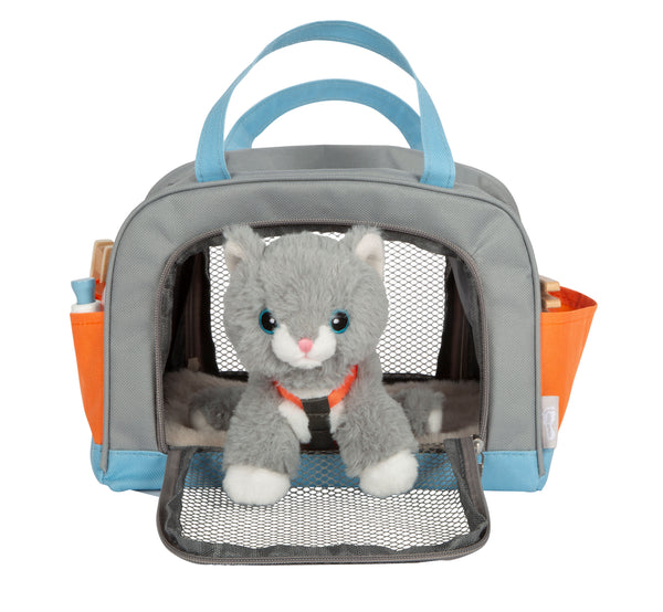 Katze mit Tasche und Pflege-Set