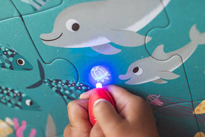 Leuchtendes Puzzle mit Mini-UV-Lampe – Ozean 24 Teile 3+ - tablude.com