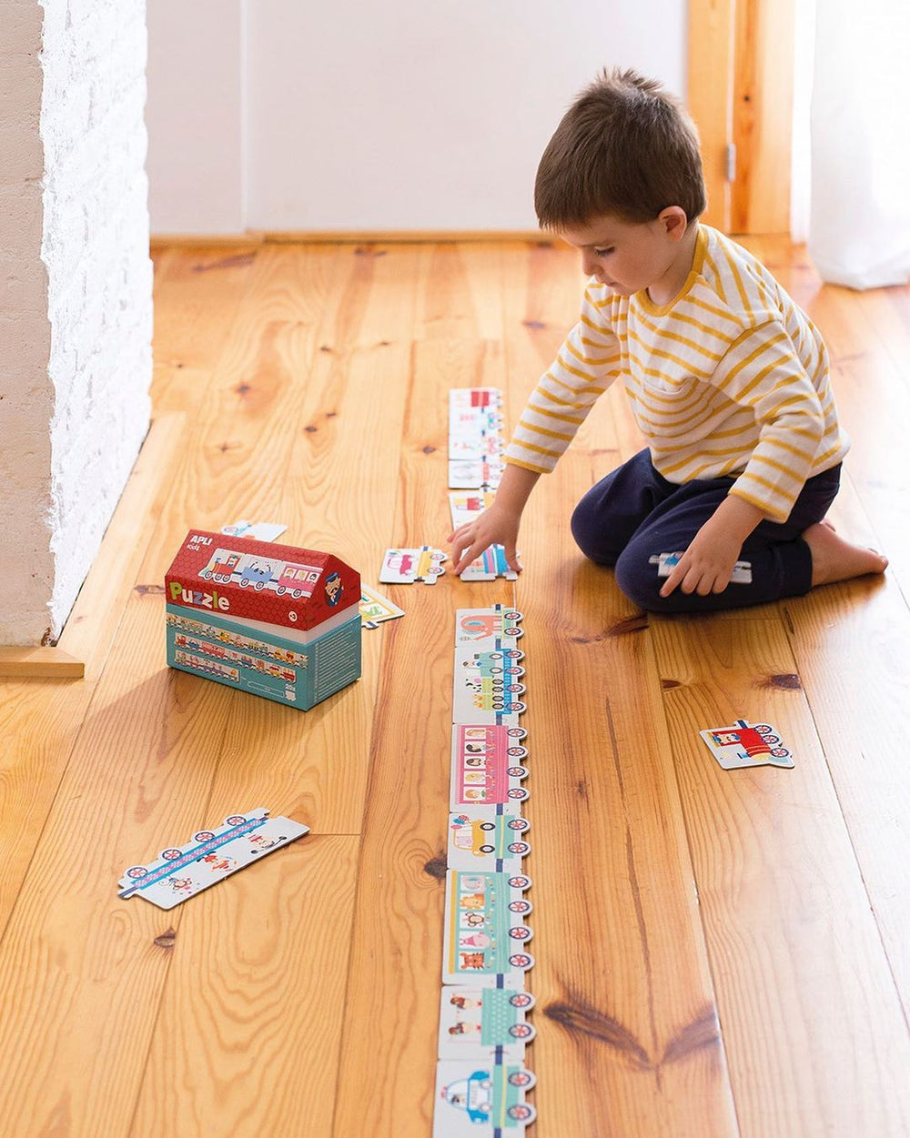Puzzle im Kartonhaus – Zug 3+ - tablude.com