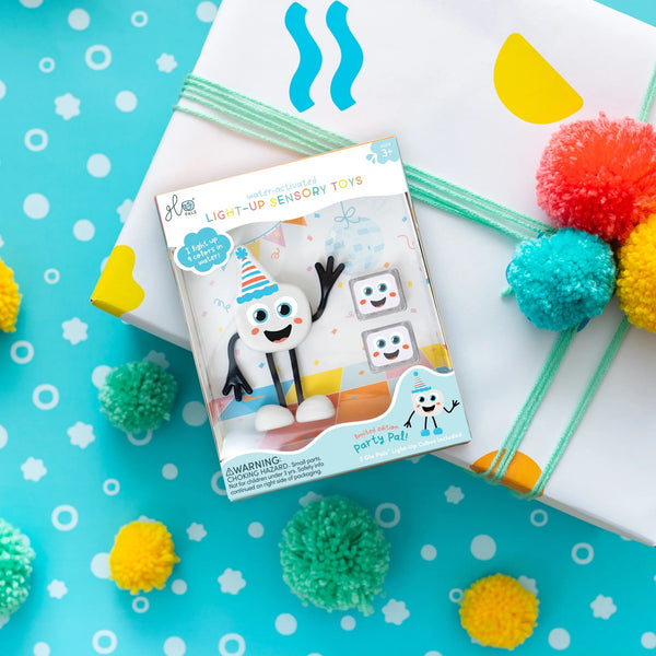 Badefigur Party Pal – Set mit zwei im Wasser leuchtenden Sensorikwürfeln - tablude.com