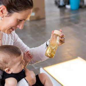 Sensorische Flasche FLOAT – Gold - tablude.com