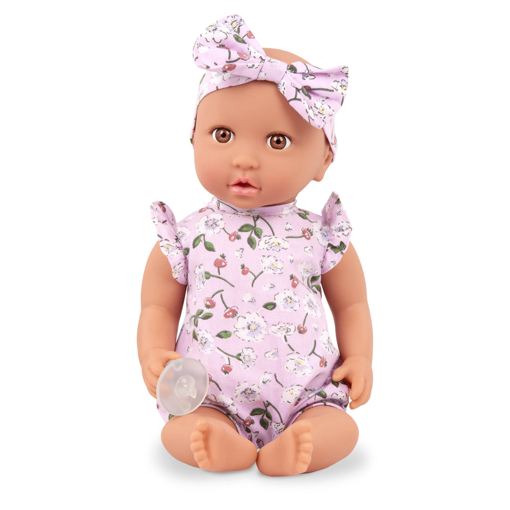 Babypuppe mit Babynest im Blümchenoutfit