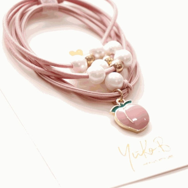 Yuko B. Haargummi-Armbänder Pfirsich - 2 Stück - Ansicht 3