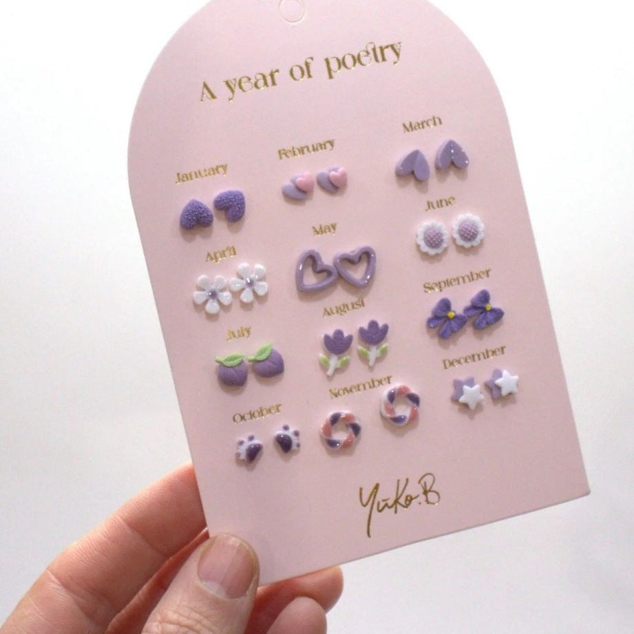 Yuko B. Ohrstecker-Set Poesie-Jahr Lila mit 12 Paar