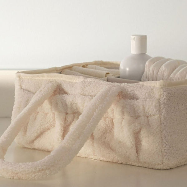 Wickelorganizer aus Teddy-Plüsch von That's Mine mit Pflegeprodukten