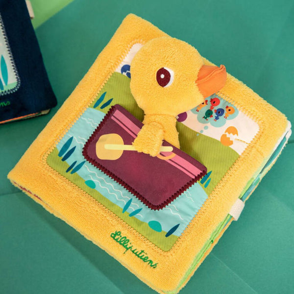Plüsch-Cover des Stoffbuchs mit Ente im Boot
