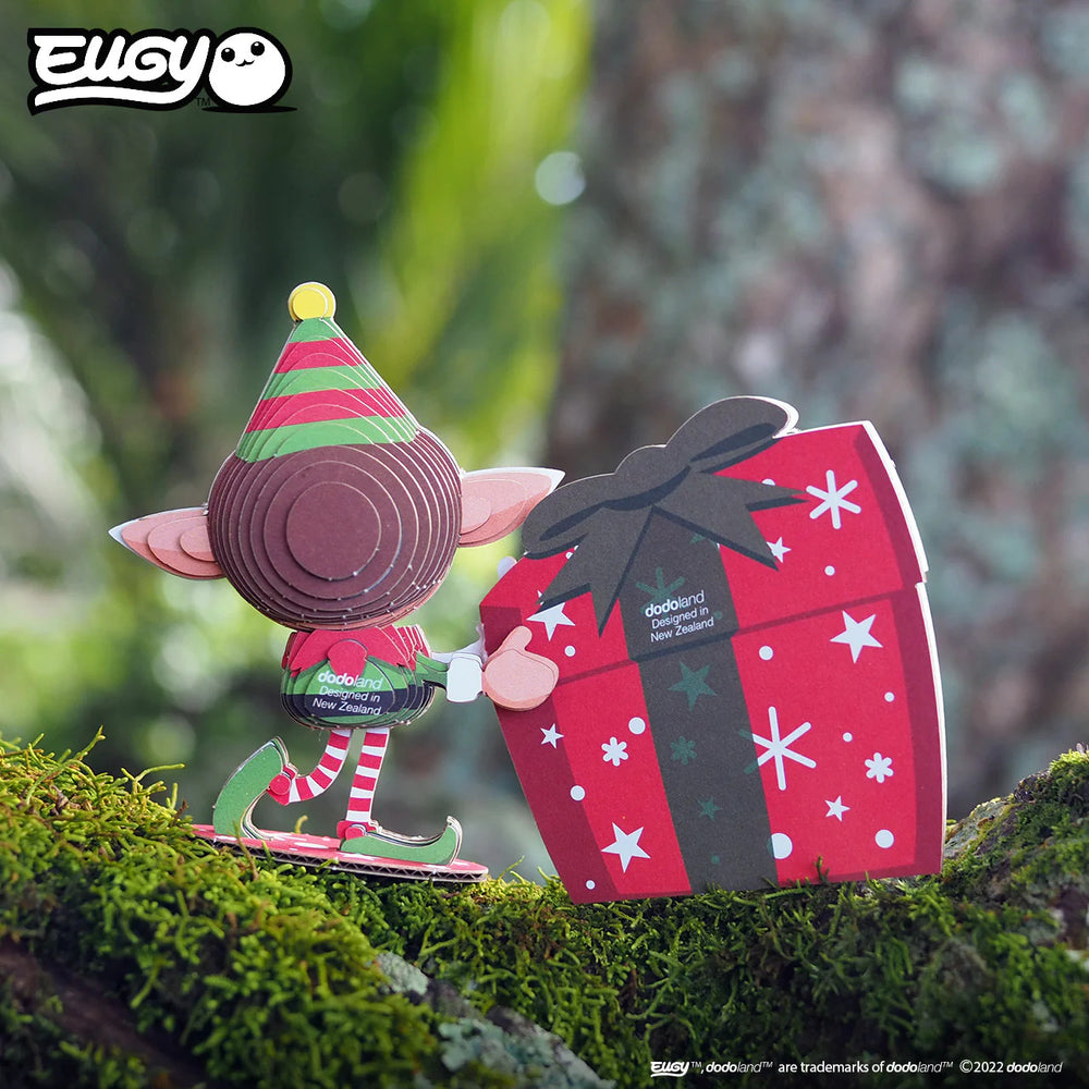 Eugy Weihnachts-Elf mit Geschenkbox in Rot und Grün für festliche Puzzle-Unterhaltung