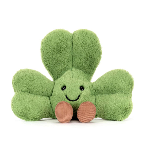 Jellycat Glücksklee Plüschspielzeug in Grün mit lächelndem Gesicht und schokoladenbraunen Beinen