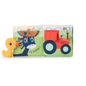 Stoffbuch-Seite mit Esel und Traktor, Klappen geschlossen, daneben Mini-Kuscheltier Ente