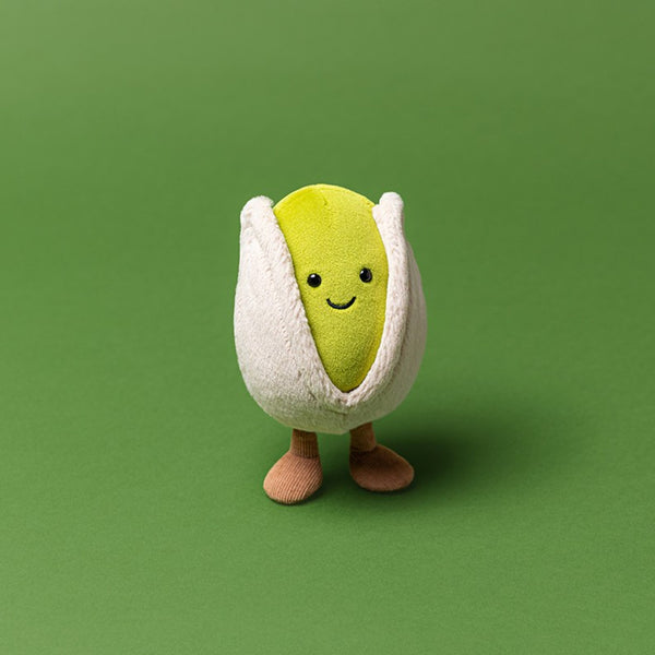 Jellycat Plüsch Pistazie 14 cm Kuscheltier mit freundlichem Gesicht und aufrecht stehenden Beinen