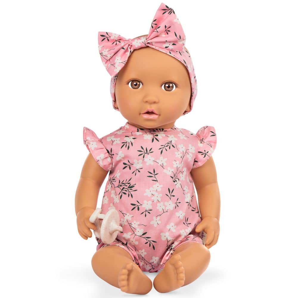 Babypuppe mit Schnuller – In rosa Kleidchen mit Blümchenmuster und Haarband