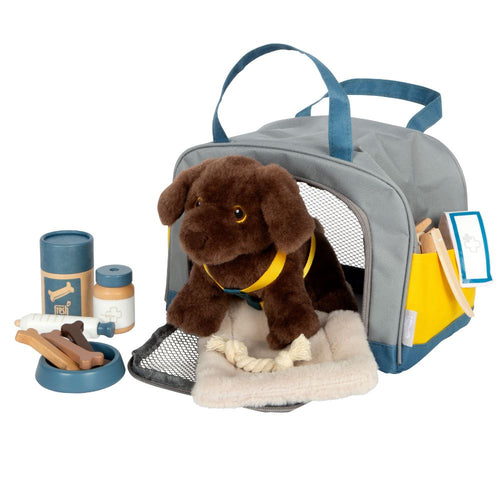 Labrador-Hund mit Tasche und Pflege-Set