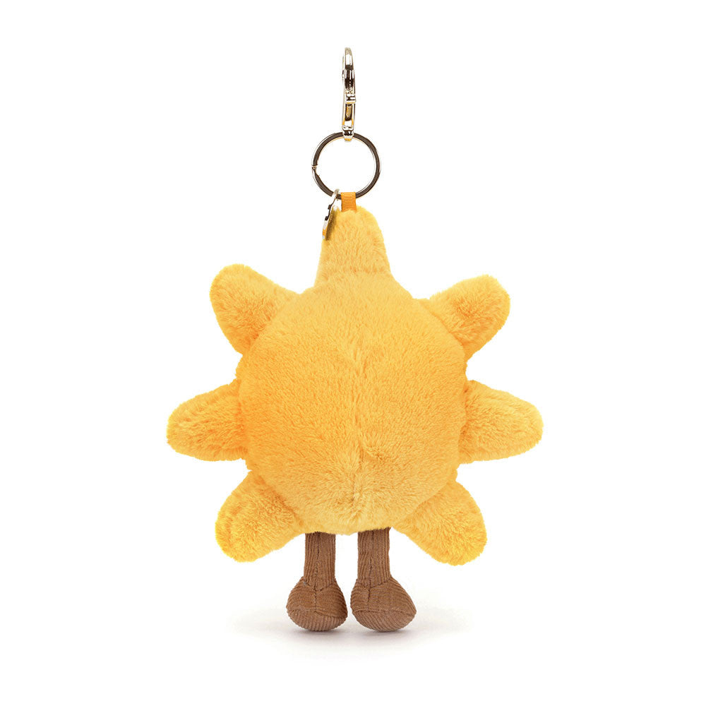 Schlüsselanhänger – Lächelnde Sonne 20 cm von Jellycat, weicher gelber Plüsch mit Füßen und lachendem Gesicht
