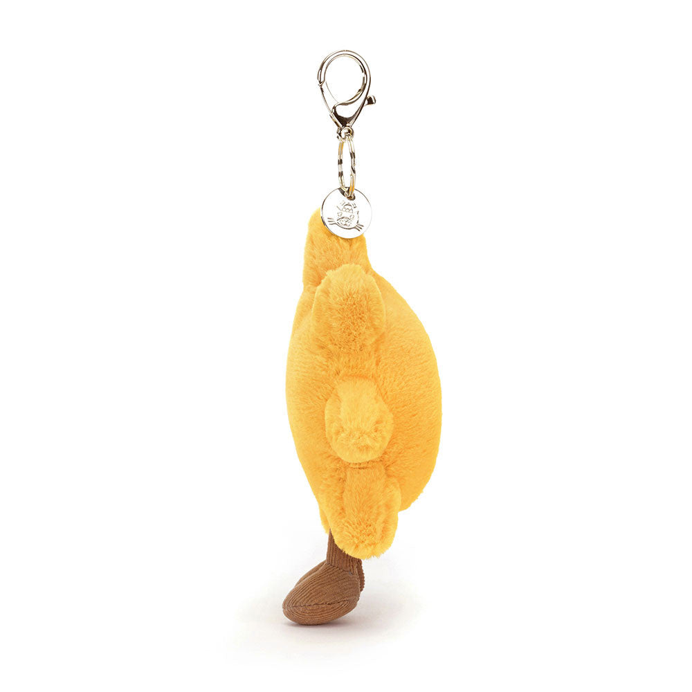 Schlüsselanhänger – Lächelnde Sonne 20 cm von Jellycat, weicher gelber Plüsch mit Füßen und lachendem Gesicht